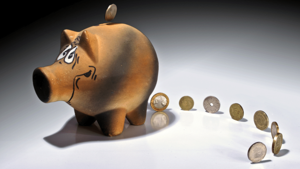 Brown piggy bank slowly losing money